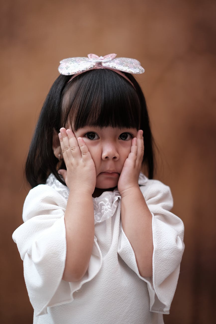 small asian girl with headband