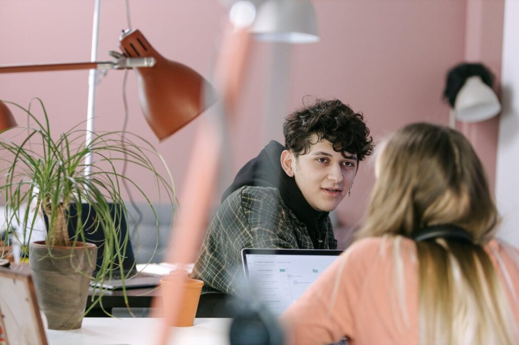 man people woman laptop